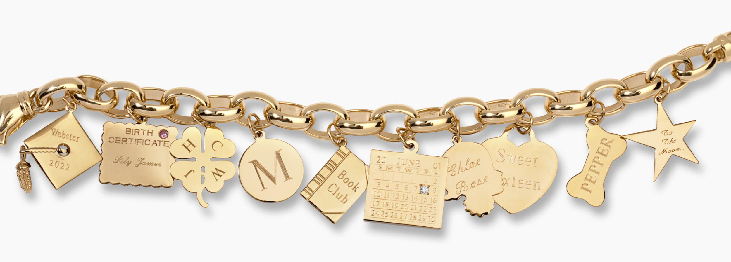 close up of engraved charms